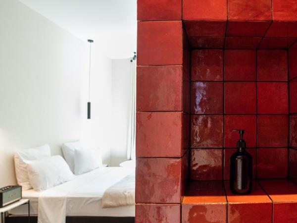 Mouchki : photo 2 de la chambre chambre double deluxe avec baignoire