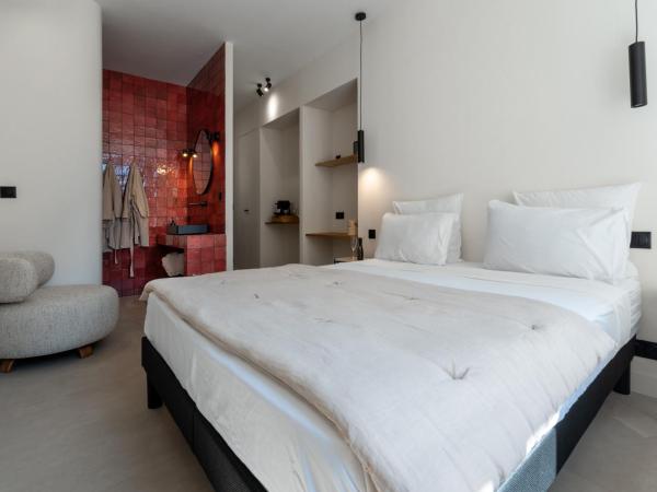 Mouchki : photo 6 de la chambre chambre double deluxe avec baignoire