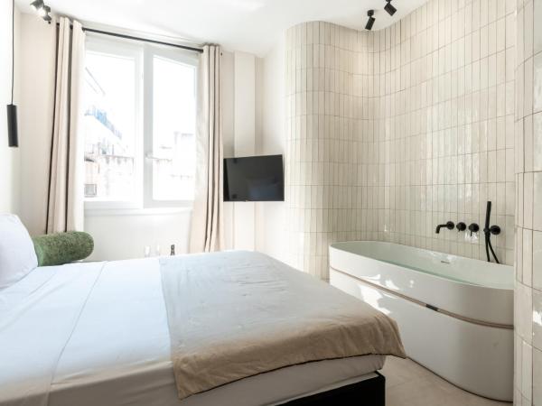 Mouchki : photo 1 de la chambre chambre double deluxe avec baignoire