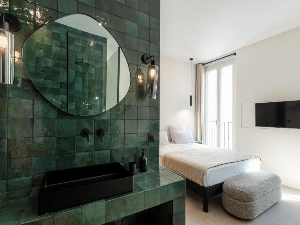 Mouchki : photo 5 de la chambre chambre double deluxe avec baignoire