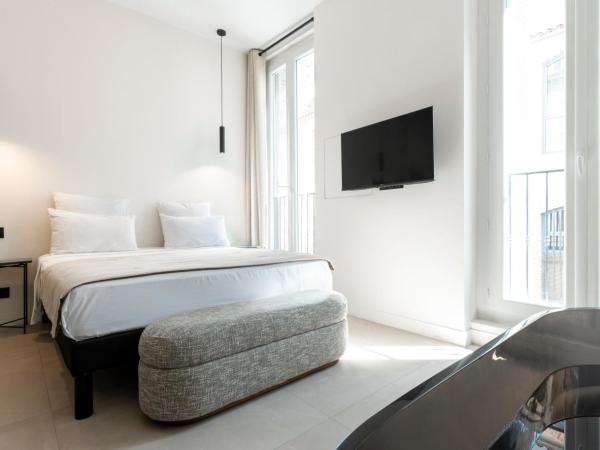 Mouchki : photo 4 de la chambre chambre double deluxe avec baignoire