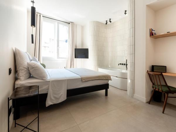 Mouchki : photo 7 de la chambre chambre double deluxe avec baignoire