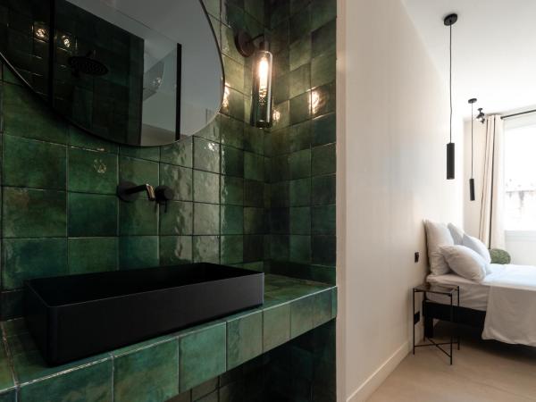 Mouchki : photo 4 de la chambre chambre double deluxe avec baignoire