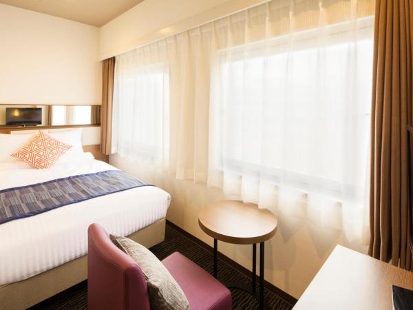 Hotel Mystays Gotanda Station : photo 1 de la chambre chambre double supérieure avec petit lit double - fumeurs