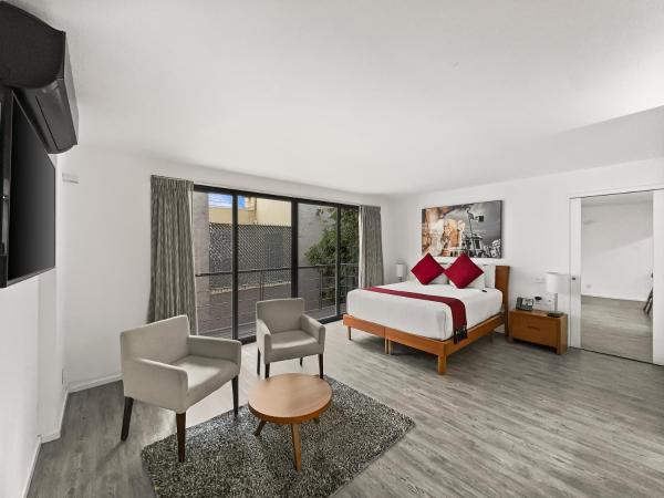 Armonik Suites By Casanevo : photo 1 de la chambre chambre double deluxe avec 1 lit queen-size