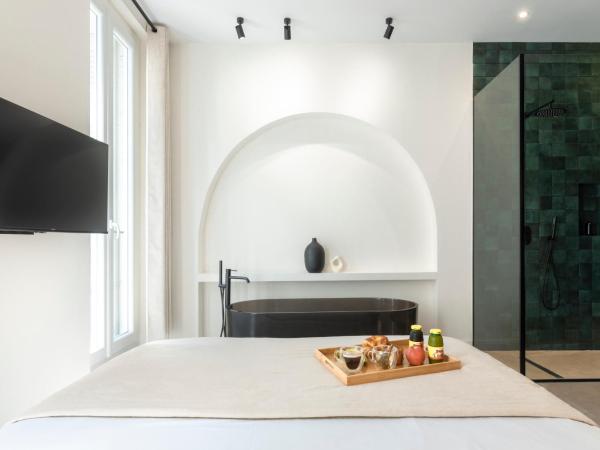 Mouchki : photo 1 de la chambre chambre double deluxe avec baignoire