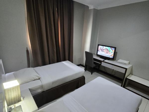 N3 Zainul Arifin Hotel : photo 3 de la chambre chambre deluxe double ou lits jumeaux