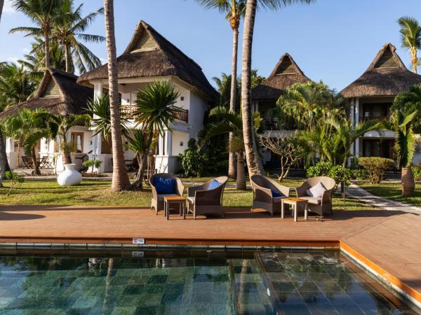 Constance Sakoa Boutik : photo 6 de la chambre suite junior - vue sur jardin