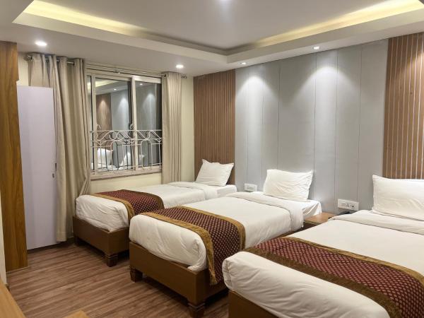 Hotel Nirakar : photo 7 de la chambre chambre triple basique