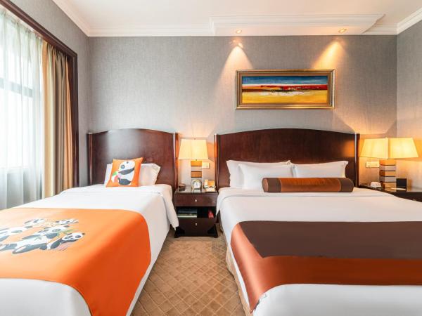 Grand International Hotel : photo 3 de la chambre family twin room