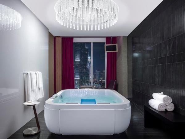 Sofitel Dubai Downtown : photo 3 de la chambre suite royale lit king-size avec vue et accès au club