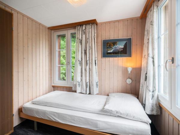 Jungfrau Lodge, Swiss Mountain Hotel : photo 10 de la chambre chambre triple avec salle de bains privative - vue sur montagne