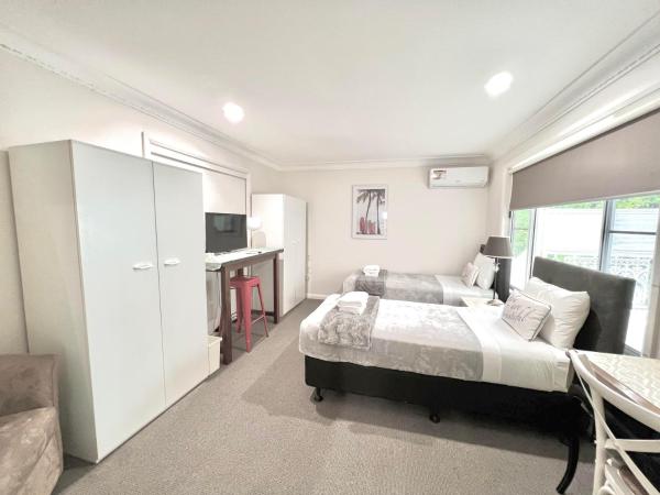 North Ryde Guesthouse : photo 1 de la chambre chambre lits jumeaux de luxe avec salle de bains commune