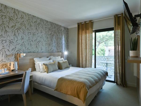 Hôtel La Ménado : photo 1 de la chambre chambre double ou lits jumeaux standard