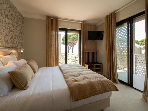 Hôtel La Ménado : photo 4 de la chambre chambre double ou lits jumeaux supérieure - vue sur mer