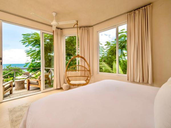 Casa Coco by Coco B Isla : photo 7 de la chambre suite deluxe - vue sur mer