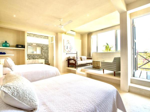 Casa Coco by Coco B Isla : photo 3 de la chambre chambre familiale - vue sur jardin