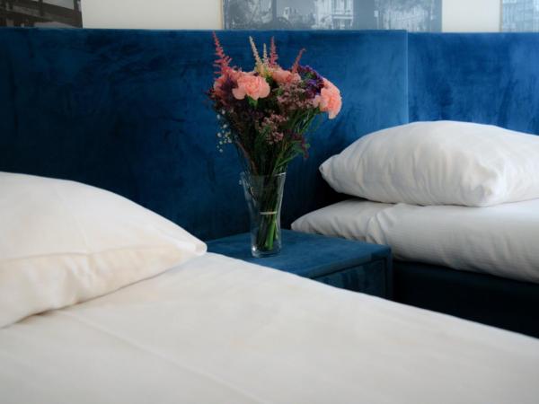 Hotel 55 - City Centre : photo 9 de la chambre chambre triple confort avec douche