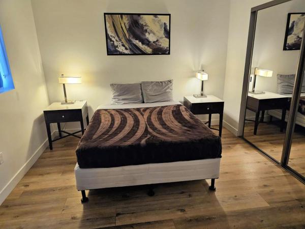 Hollywood Homes minutes to everything SPACIOUS AND FREE PARKING : photo 8 de la chambre five bedroom townhouse at mariposa