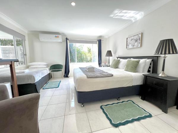 North Ryde Guesthouse : photo 2 de la chambre chambre triple avec salle de bains privative