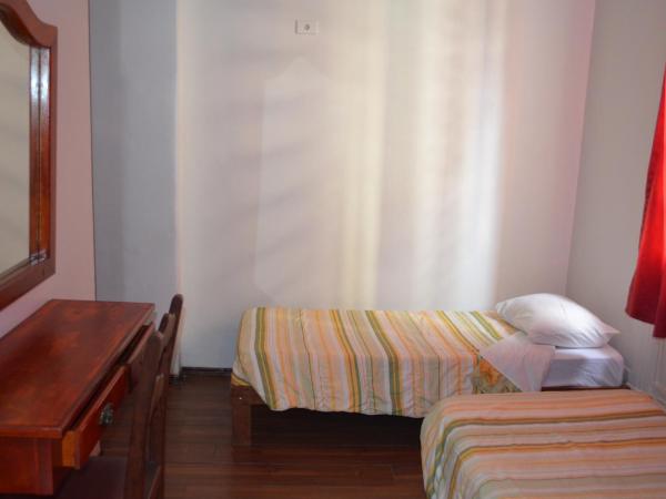 Reinales Plaza Hotel : photo 3 de la chambre chambre quadruple de luxe