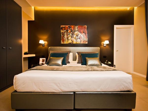 Delle Vittorie Luxury Rooms&Suites : photo 4 de la chambre chambre deluxe double ou lits jumeaux