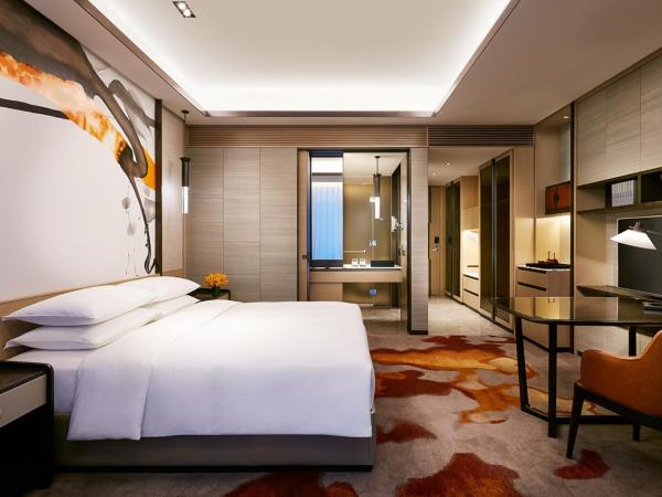 Hyatt Regency Wuxi : photo 1 de la chambre chambre lit king-size
