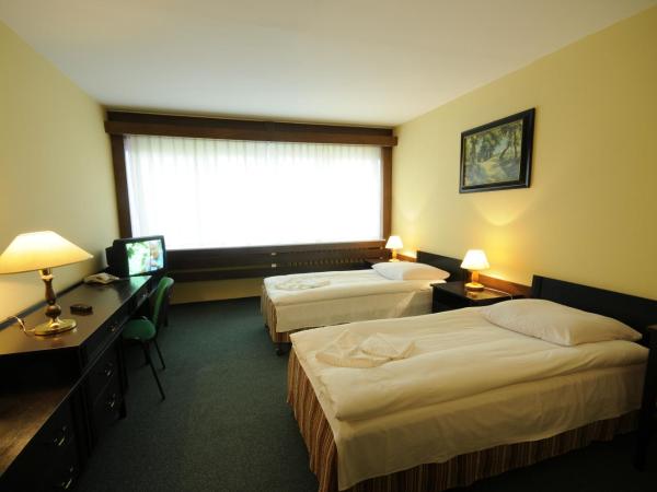 Olimpia : photo 2 de la chambre chambre lits jumeaux