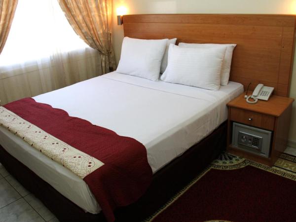 Al Ahrar Hotel : photo 1 de la chambre chambre lit king-size