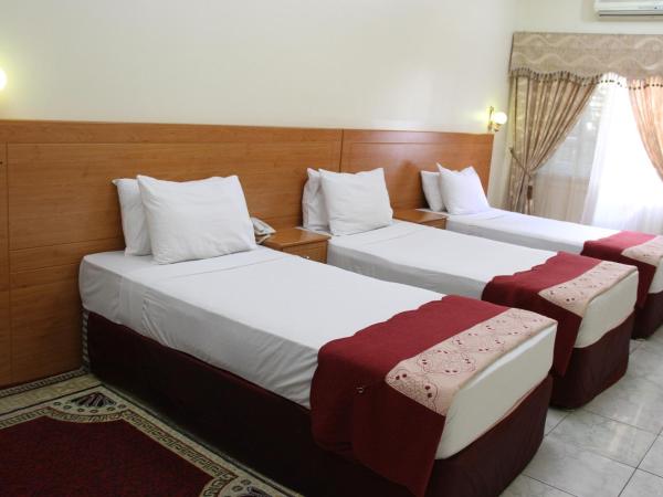 Al Ahrar Hotel : photo 2 de la chambre chambre quadruple classique