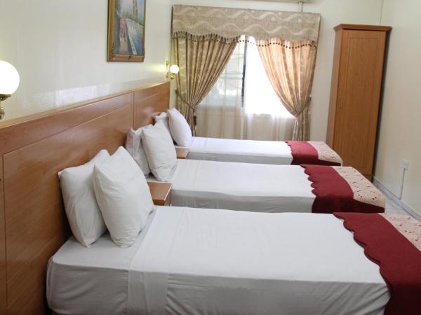 Al Ahrar Hotel : photo 4 de la chambre chambre quadruple classique