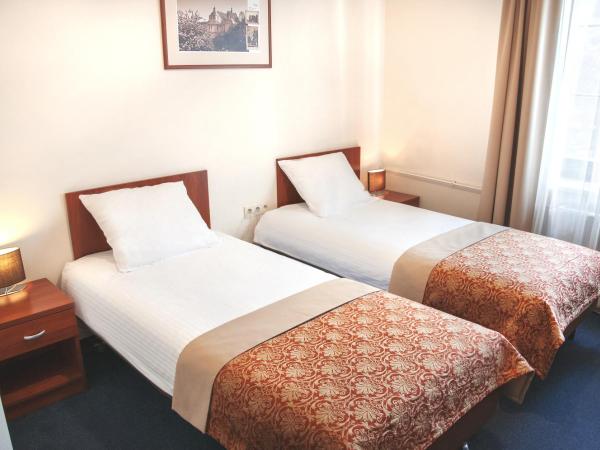 Dom na Podwalu : photo 3 de la chambre chambre lits jumeaux