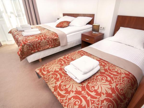 Dom na Podwalu : photo 2 de la chambre chambre lits jumeaux