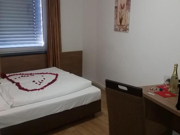 Apartment Hotel am Sand : photo 7 de la chambre chambre double ou lits jumeaux