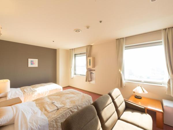 Hiroshima International Youth House JMS Aster Plaza : photo 1 de la chambre chambre lits jumeaux deluxe