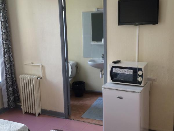 Au Royal Mad : photo 5 de la chambre chambre lits jumeaux avec salle de bains
