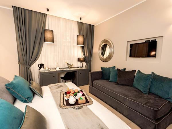 Delle Vittorie Luxury Rooms&Suites : photo 7 de la chambre chambre deluxe double ou lits jumeaux