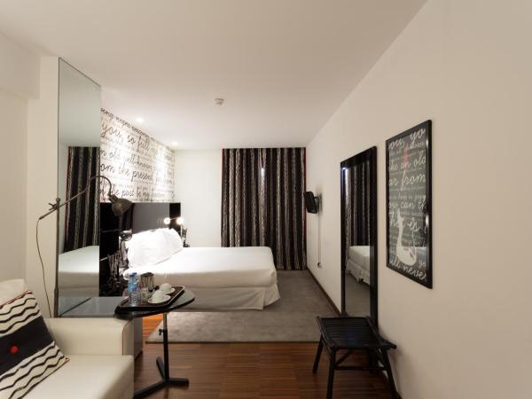 Porto Trindade Hotel : photo 1 de la chambre chambre lits jumeaux avec lit d’appoint - 301