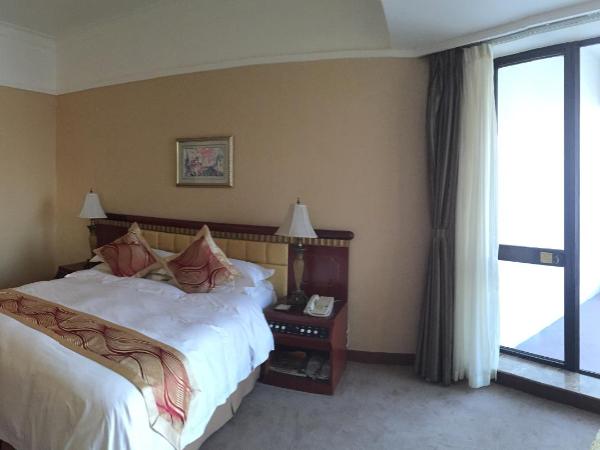 Huiquan Dynasty Hotel Qingdao : photo 7 de la chambre south wing twin room with sea view