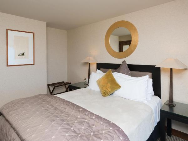 Millennium Hotel & Resort Manuels Taupo : photo 2 de la chambre suite junior lit queen-size