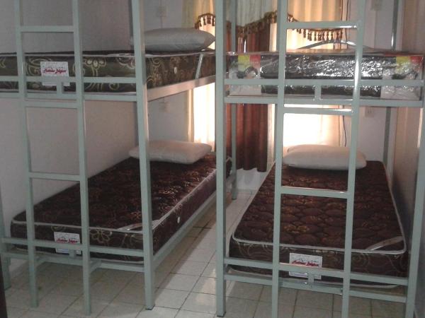 Pondok Heras Suite : photo 1 de la chambre lit simple dans dortoir pour hommes