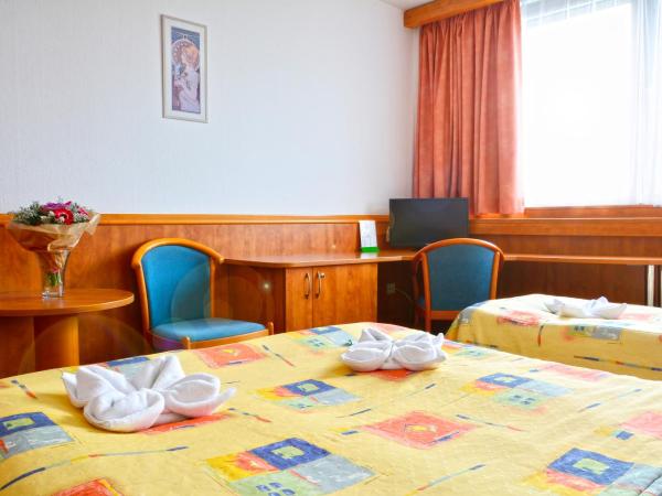 Hotel Olympik : photo 6 de la chambre chambre triple