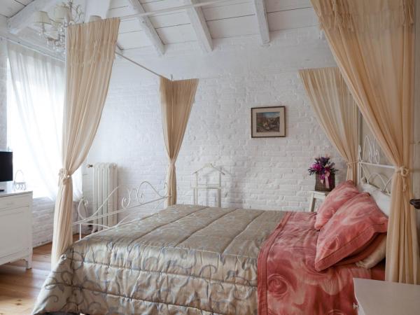 Bed & Breakfast Canova : photo 1 de la chambre chambre lit queen-size avec balcon