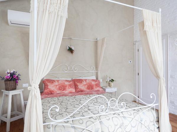 Bed & Breakfast Canova : photo 3 de la chambre chambre lit queen-size avec balcon