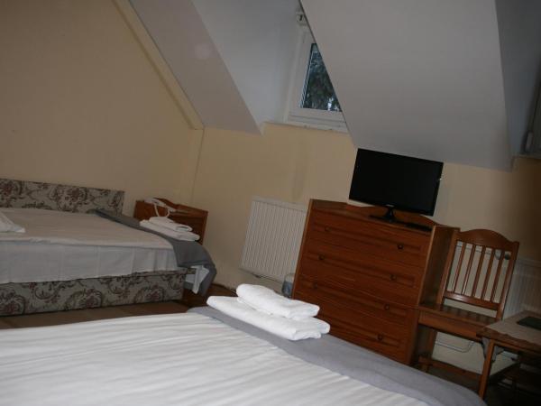 Szent György Fogadó : photo 2 de la chambre chambre triple