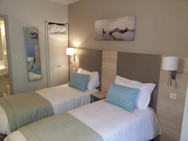 Hotel Du Midi : photo 3 de la chambre chambre lits jumeaux