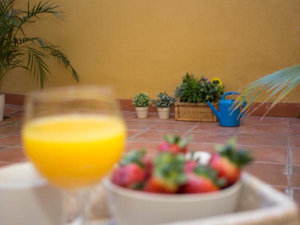 SingularStays Botanico 29 Rooms : photo 7 de la chambre chambre double avec patio