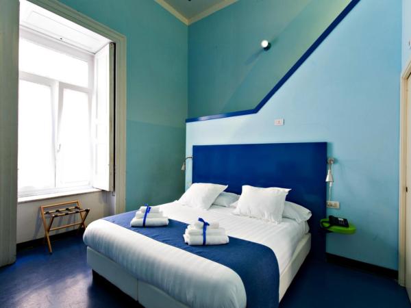 Correra 241 Lifestyle Hotel : photo 3 de la chambre chambre quadruple