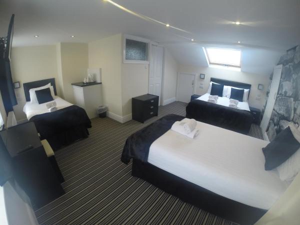 Happy Return Hotel : photo 2 de la chambre chambre familiale supérieure