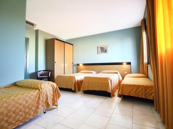 Green Sporting Club Hotel : photo 1 de la chambre chambre triple